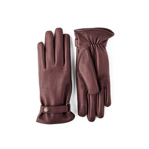 Hestra dark brown leather gloves with wrist strap and metal button