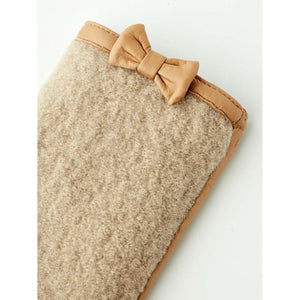 Hestra beige wool glove with leather trim and decorative leather bow