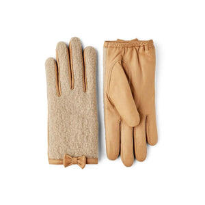 Hestra tan leather and beige wool gloves with a small bow detail