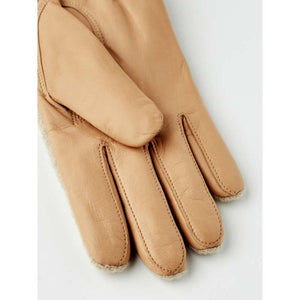 Hestra tan leather gloves with visible fleece lining