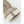 Close up of beige suede glove with ribbed knit cuff