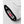 Close up of white glove cuff with black trim and red G-Loft brand label