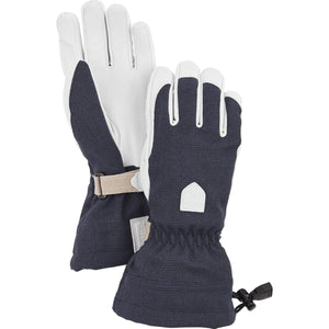 Hestra navy and white leather ski gloves with adjustable wrist strap and drawstring cuff