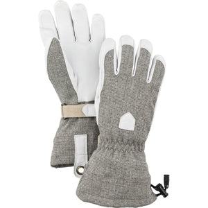Hestra grey and white leather ski gloves with adjustable wrist strap and drawstring cuff