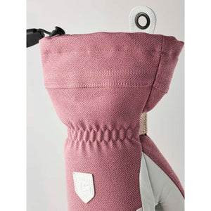 Hestra pink glove cuff with white leather pull tab and logo patch