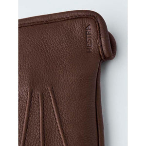 Brown leather Hestra glove detail