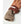 Hestra tan leather glove with a brown suede cuff and a ribbed wool lining