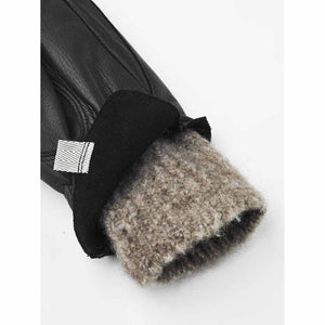 Black leather glove with grey wool cuff and small brand label