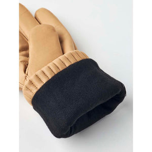 Tan Hestra leather glove with black ribbed cuff