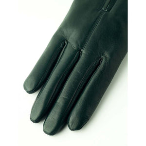 Dark green leather glove on white background