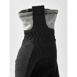 Close up of black and grey work glove cuff with pull tab