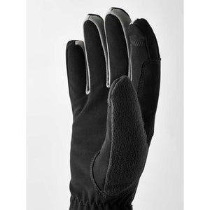 Black and grey winter glove with textured thumb panel