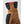 Hestra glove cuff detail showing brown suede and black fabric with pink stitching