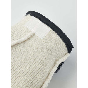 Hestra glove cuff detail with white knit fabric and black trim