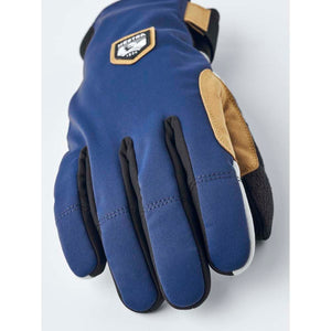 Blue Hestra glove with tan leather palm detail