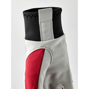 Close up of Hestra glove cuff with grey and red fabric panels