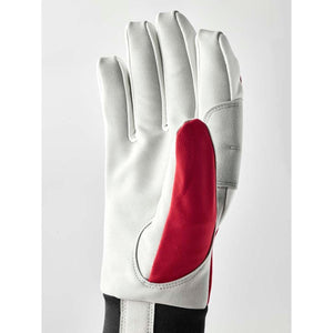 White and red athletic glove with black cuff