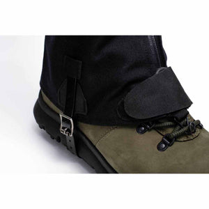 Hillsound gaiter secured with a buckle and velcro strap over a hiking boot