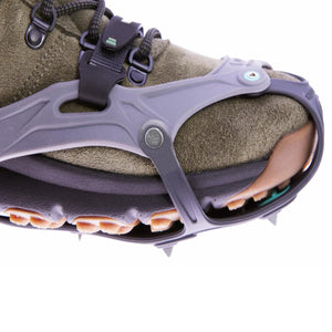 Hillsound traction device attached to the front of a hiking boot