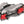 Hiking boot with red and black metal crampons attached to the sole