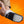 Person putting on a grey sock with a white adhesive patch on the sole