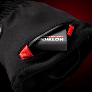 Hotronic battery pack inserted into a zippered pocket on a black glove