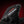 Black Hotronic glove with white brand logo and red accent line