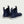 Huk navy blue ankle boots with white soles and pull tabs
