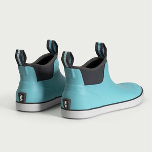 Huk light blue waterproof ankle boots with grey soles and pull tabs
