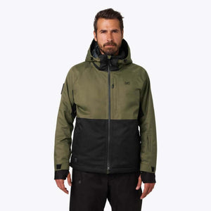 Man wearing a Mobile Warming olive and black hooded jacket