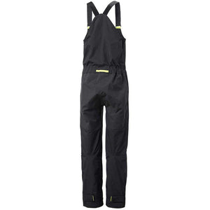 Back view of black Helly Hansen waterproof bib overalls with adjustable straps and yellow accents