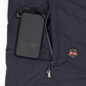 Mobile Warming battery pack connected to a black quilted garment pocket