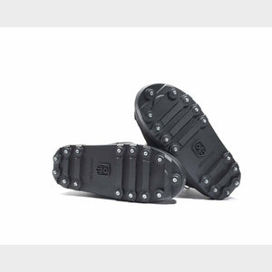 Impacto black rubber ice cleats with metal studs on the soles