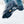Impacto ice traction cleat on a boot sole walking in snow