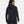 Back view of a person wearing a black Under Armour hooded jacket