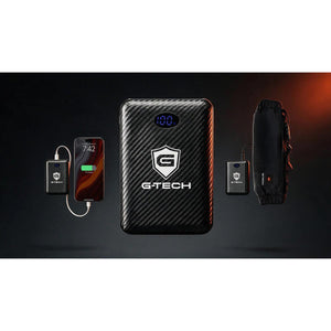 G-Tech power bank charging a smartphone and a heated hand warmer