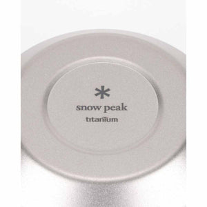 Base of a Snow Peak titanium bowl with brand logo