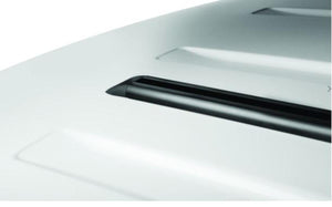 Thule roof rack mounting track on a white vehicle roof
