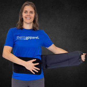 Woman wearing a blue ThermApparel t-shirt holding a black cooling belt