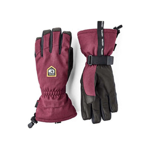 Hestra burgundy and black insulated ski gloves with adjustable wrist straps