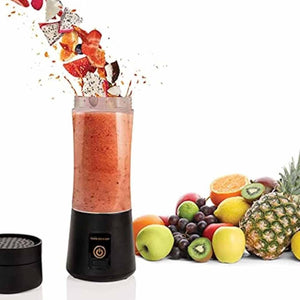Jobar portable blender with fruit pieces flying into the container