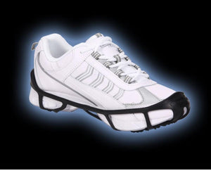 Due North traction aid attached to a white athletic shoe