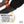 K1 Ice Cleats traction pad attached to a shoe with an adjustable strap