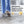 Person wearing K1 Ice Cleats on shoes while walking on a snowy surface