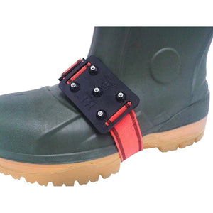 Black and red gear guard attached to a green rubber boot