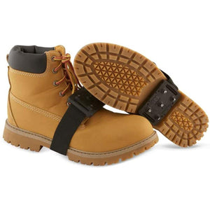 K1 Ice Cleats attached to a tan work boot showing the metal spikes on the sole