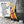 K1 Ice Cleats traction pad with adjustable strap on a boot showing one size fits all feature