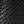 Close up of K1 Ice Cleats tread pattern with repeating logo texture