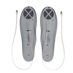 Pair of grey Therm-ic heated insoles with attached power cables
