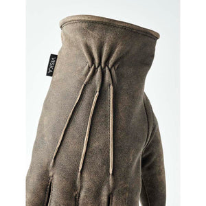 Hestra brown leather glove with decorative stitching on the back